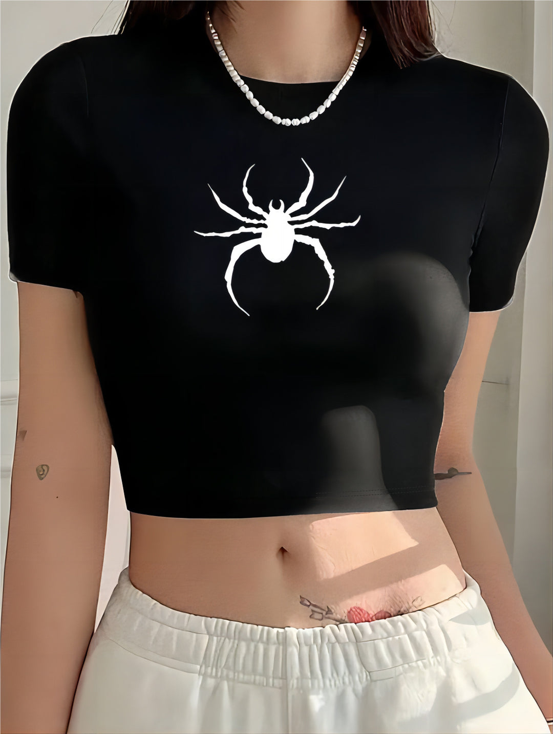 Damer Crop-T-shirt med modern grafisk tryck Mirla-Eva Jonsson