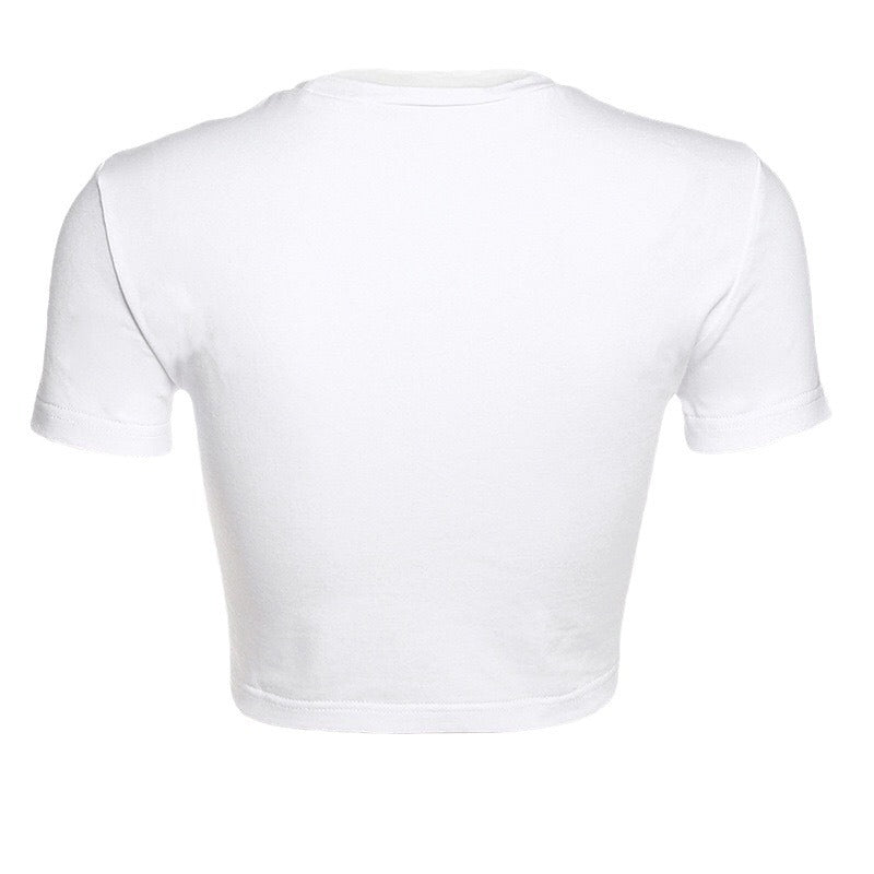 Damer Crop-T-shirt med modern skärning och figurnära design Mirla-Eva Jonsson
