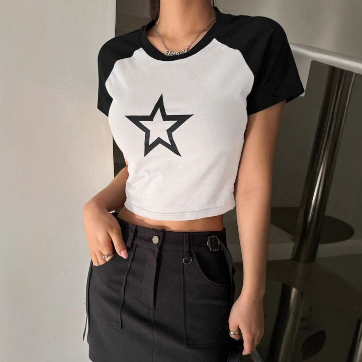 Damer Crop-T-shirt med stiligt stjärnmotiv och bekväm passform Mirla-Eva Jonsson