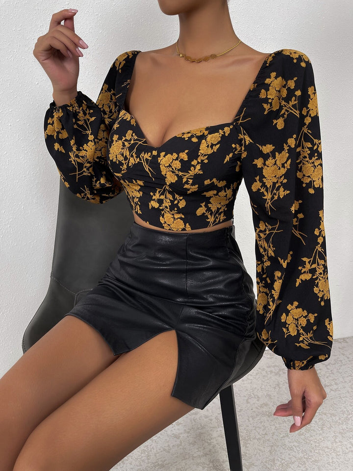 Damer Crop Top med blommönster och eleganta puffärmar Mirla-Eva Jonsson
