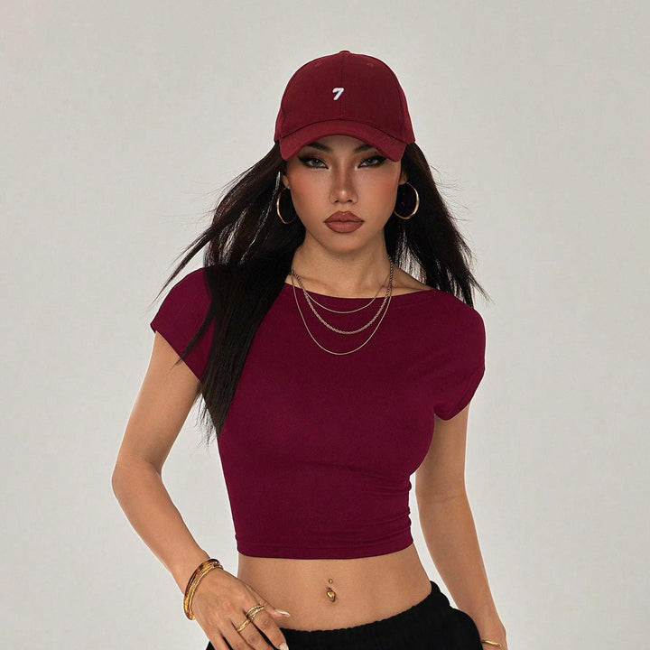 Damer Crop-Top med bred u-ringning och kroppsnära passform Mirla-Eva Jonsson