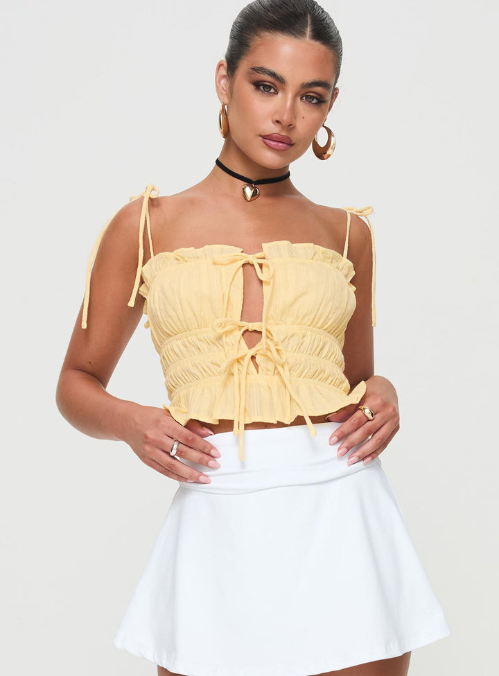 Damer Crop-top med dekorativ snörning och volangdetaljer Mirla-Eva Jonsson