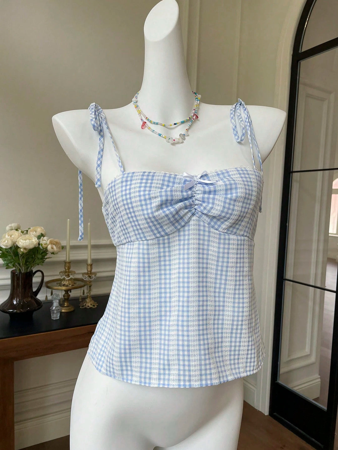 Damer Crop-top med lekfullt knutna band och rutig mönster Mirla-Eva Jonsson