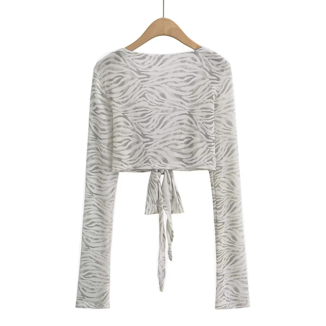Damer Cropped Långärmad topp med Raffinerad Knyt-design och Elastiskt Tyg Mirla-Eva Jonsson