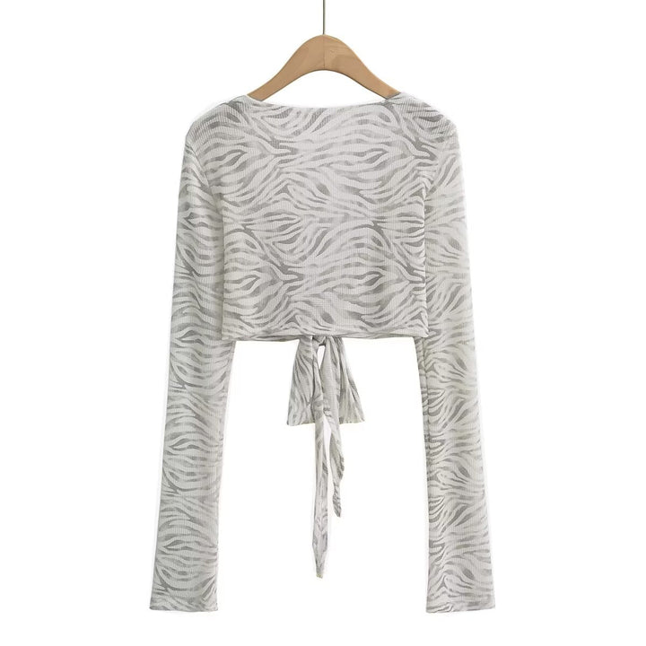 Damer Cropped Långärmad topp med Raffinerad Knyt-design och Elastiskt Tyg Mirla-Eva Jonsson