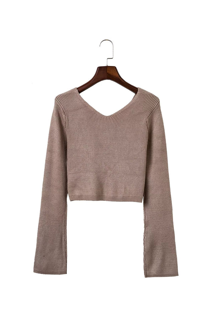 Damer Cropped Stickad tröja med asymmetrisk design och figurnära blyertskjol Mirla-Eva Jonsson