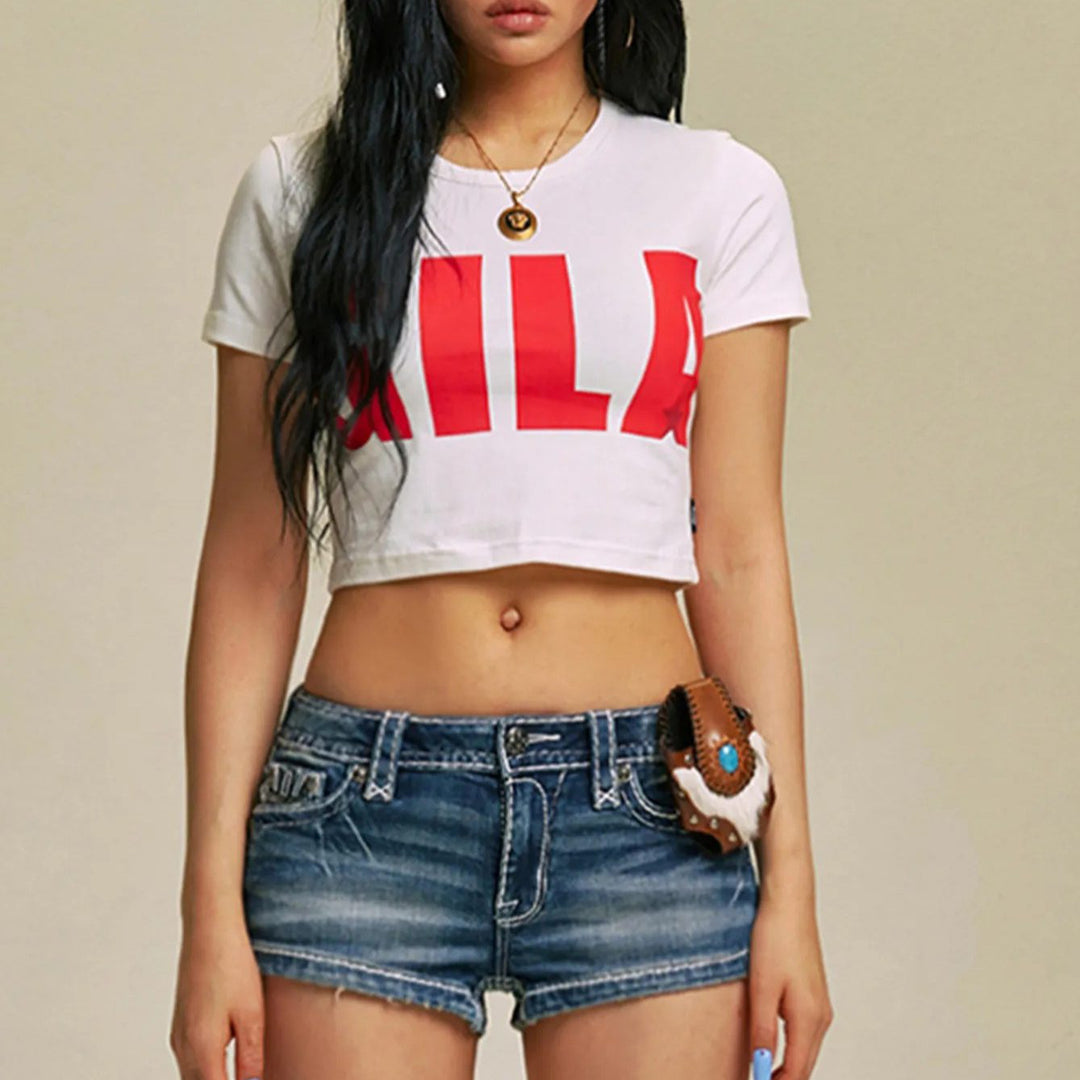Damer Cropped T-shirt med iögonfallande grafiskt tryck Mirla-Eva Jonsson