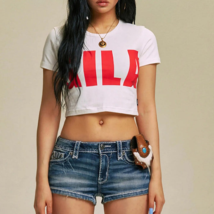 Damer Cropped T-shirt med iögonfallande grafiskt tryck Mirla-Eva Jonsson
