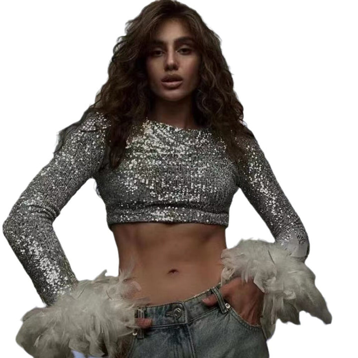 Damer Cropped topp med glittrande paljetter och fluffiga ärmslut Mirla-Eva Jonsson