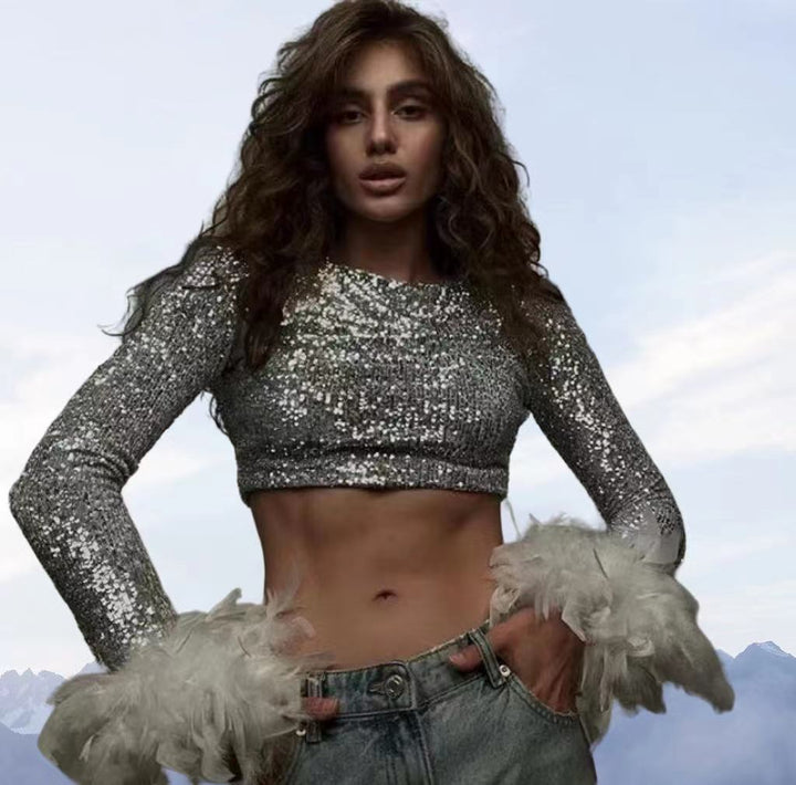 Damer Cropped topp med glittrande paljetter och fluffiga ärmslut Mirla-Eva Jonsson