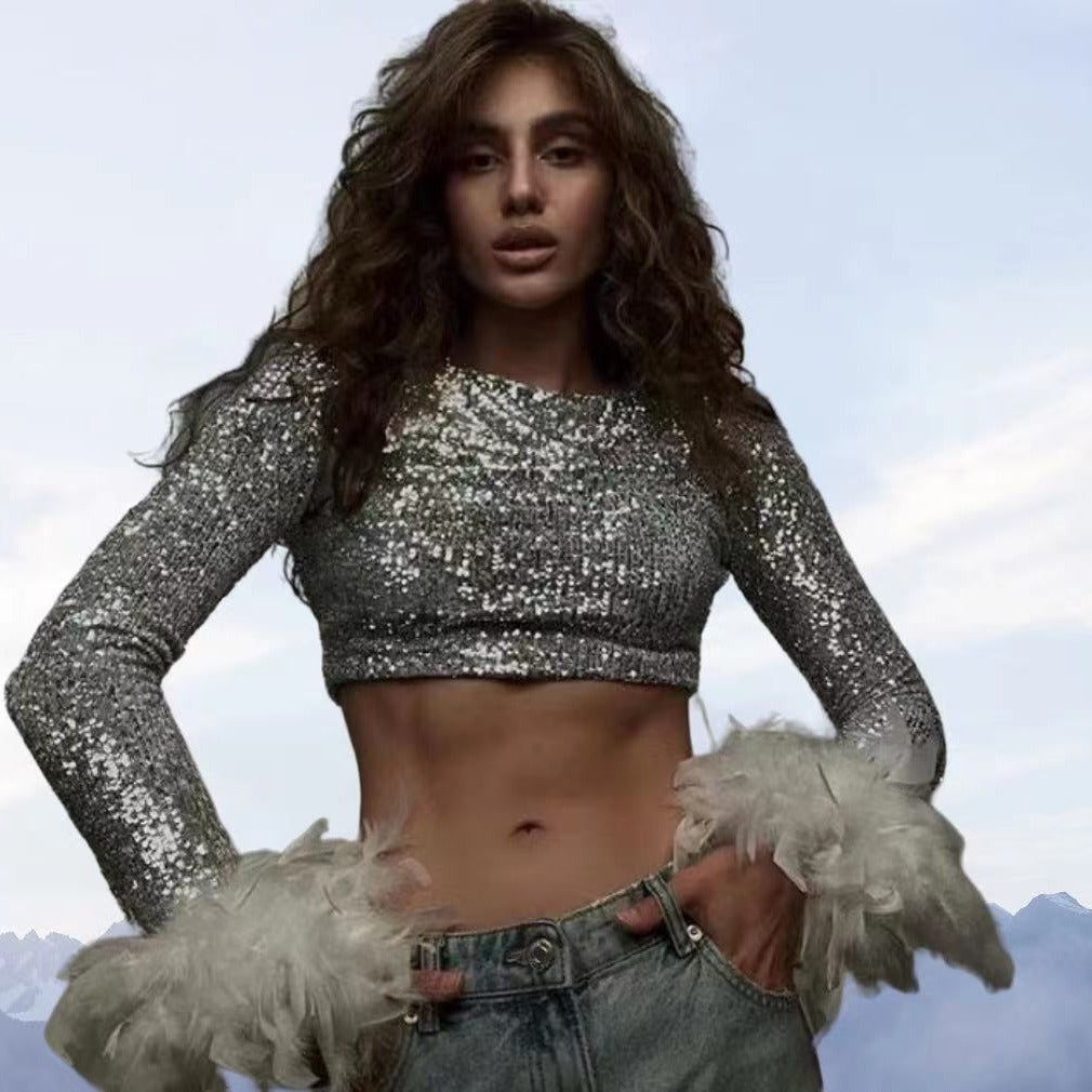 Damer Cropped topp med glittrande paljetter och fluffiga ärmslut Mirla-Eva Jonsson