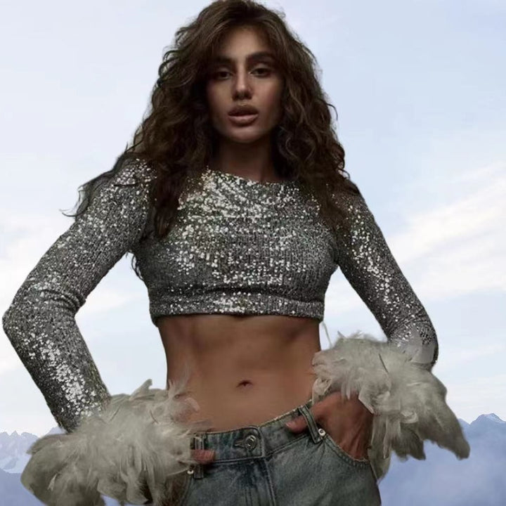 Damer Cropped topp med glittrande paljetter och fluffiga ärmslut Mirla-Eva Jonsson