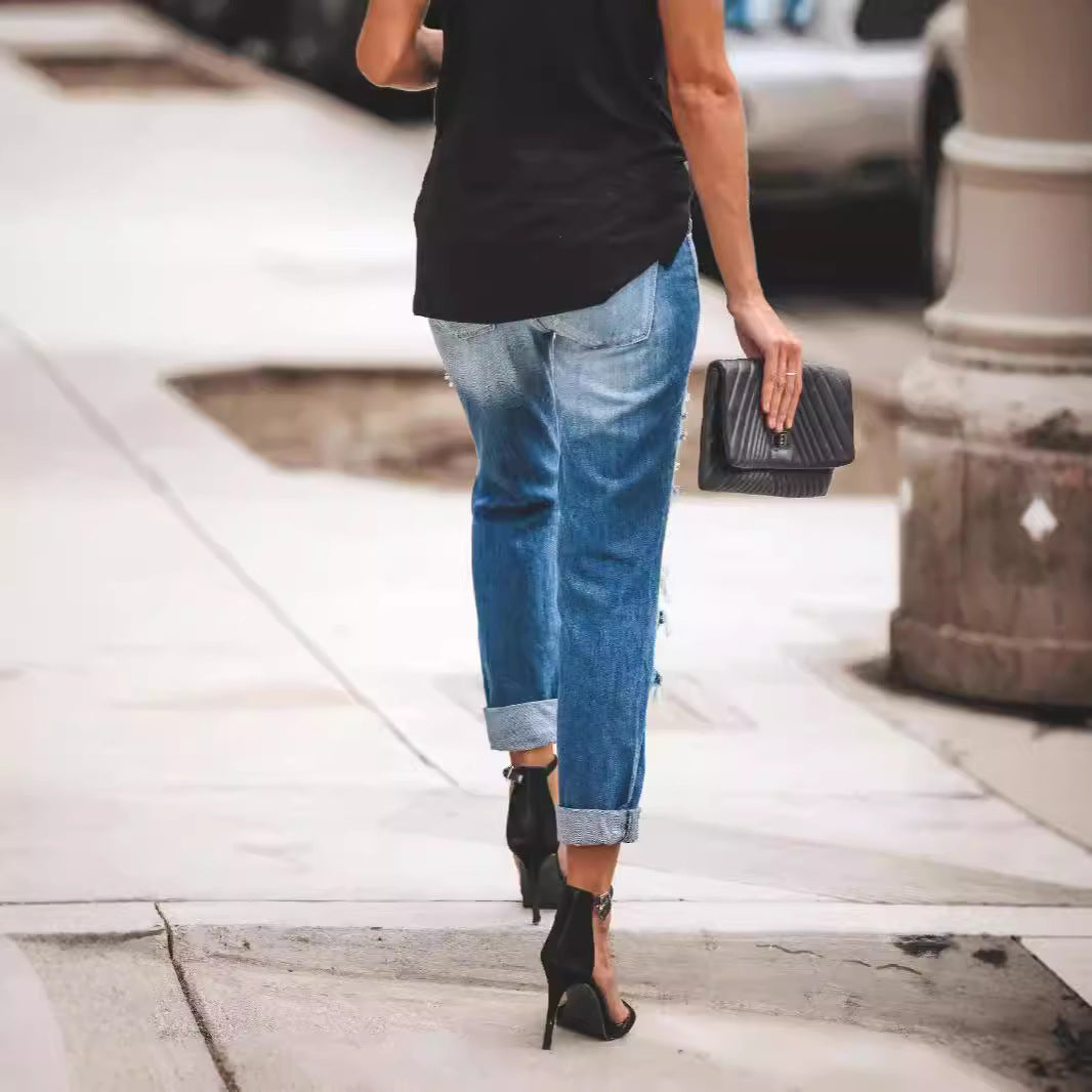 Damer Destroyed Boyfriend Jeans i avslappnad stil med höga sprickdetaljer Mirla-Eva Jonsson