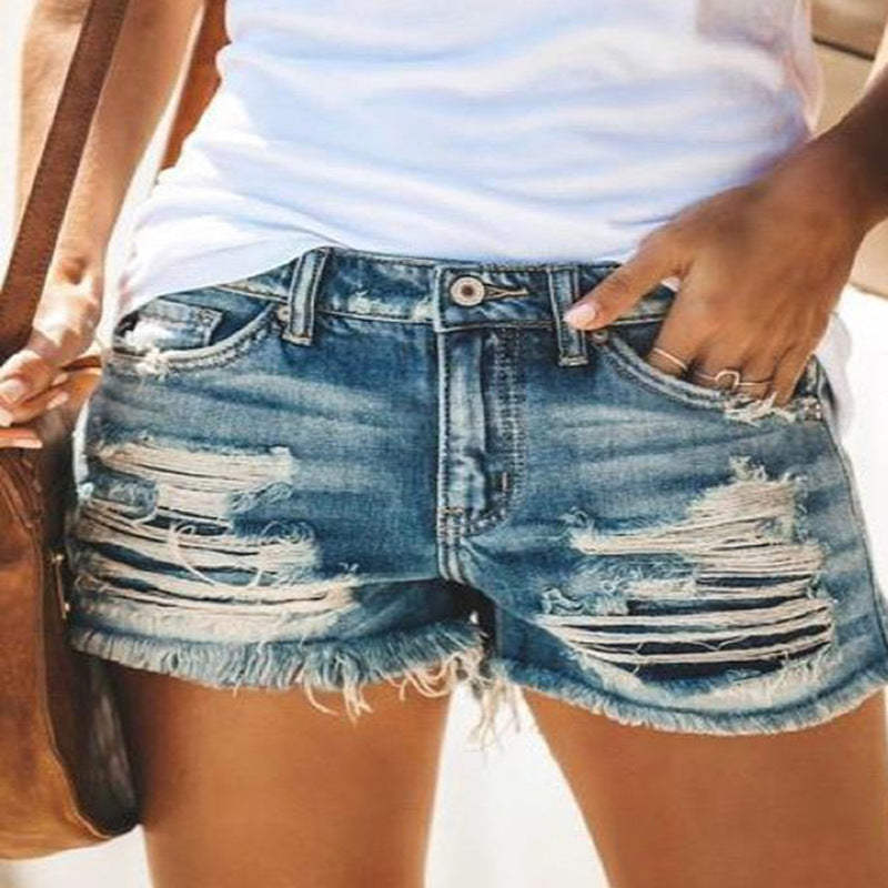 Damer Destroyed Denim-shorts i modern look med fransar Mirla-Eva Jonsson