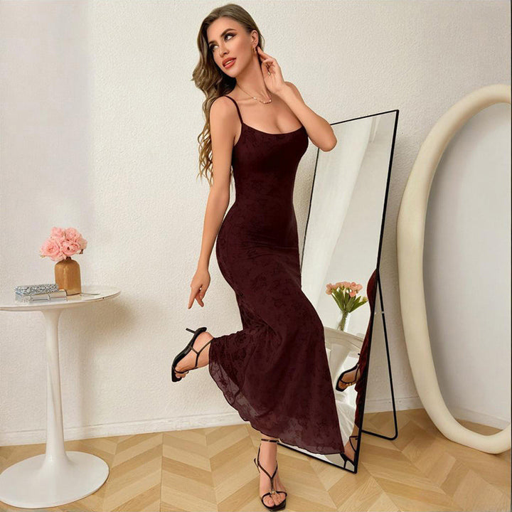 Damer Elegant Aftonklänning med Blommiga Accenter och Smal Passform Mirla-Eva Jonsson