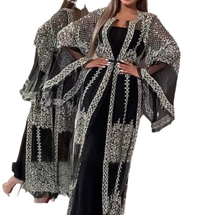 Damer Elegant Aftonklänning med Konstfulla Spets- och Paljettdekorationer Mirla-Eva Jonsson