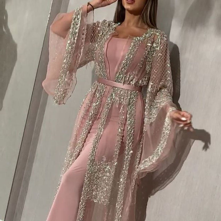 Damer Elegant Aftonklänning med Konstfulla Spets- och Paljettdekorationer Mirla-Eva Jonsson