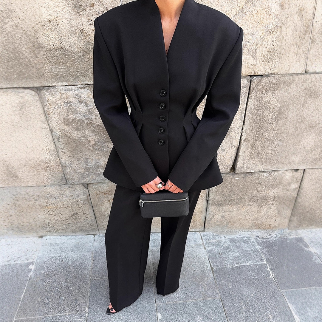 Damer Elegant Blazer-byxdress med figursydd silhuett och klassiska knapppdetaljer Mirla-Eva Jonsson