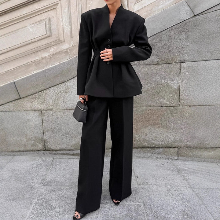 Damer Elegant Blazer-byxdress med figursydd silhuett och klassiska knapppdetaljer Mirla-Eva Jonsson