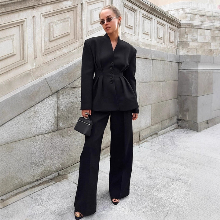 Damer Elegant Blazer-byxdress med figursydd silhuett och klassiska knapppdetaljer Mirla-Eva Jonsson