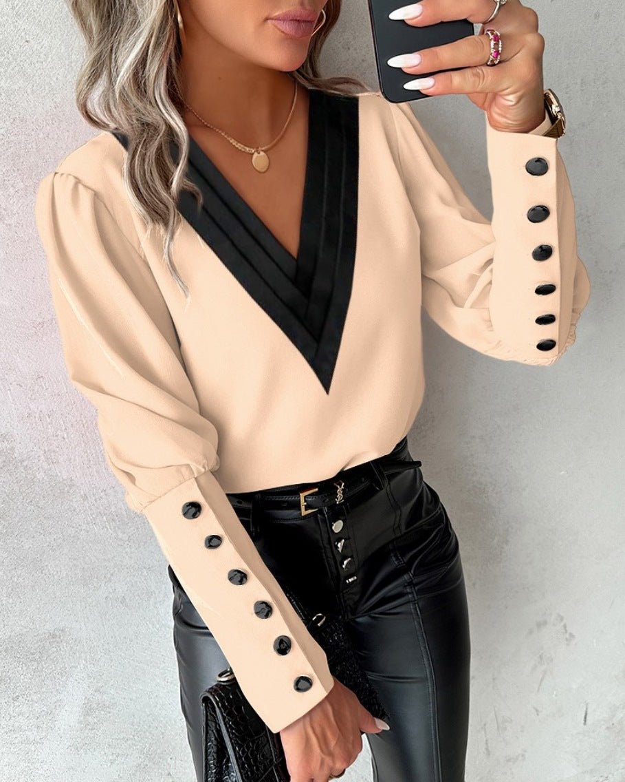 Damer Elegant Blus med djup V-ringning och detaljerad axeldel Mirla-Eva Jonsson