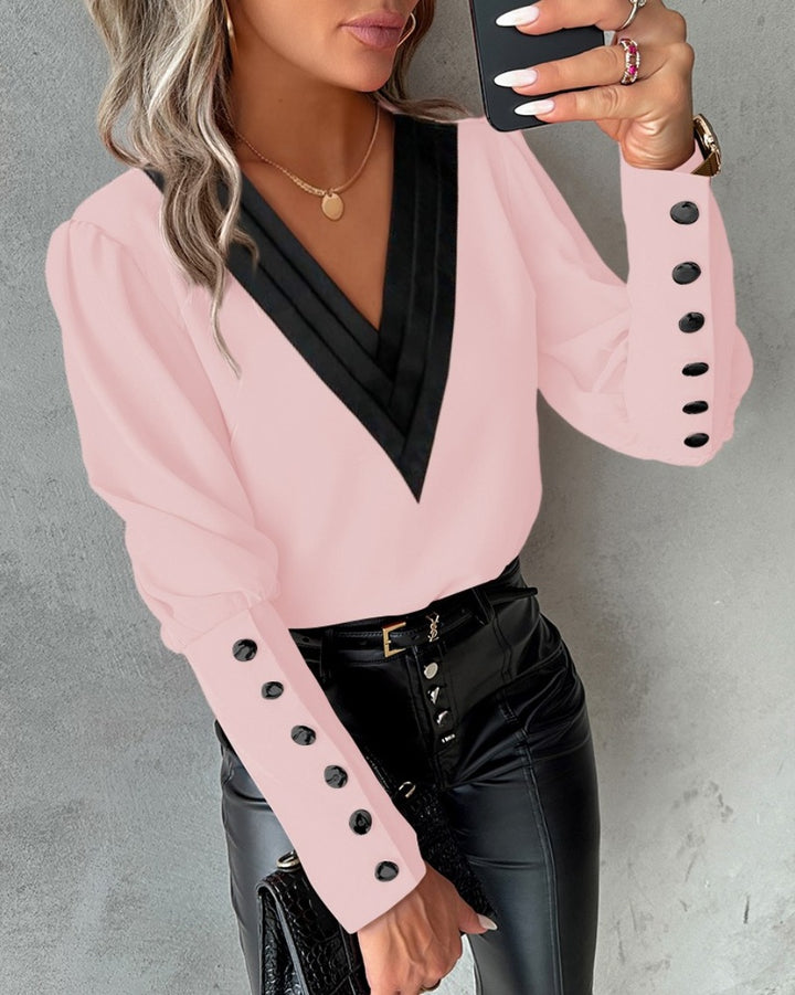Damer Elegant Blus med djup V-ringning och detaljerad axeldel Mirla-Eva Jonsson