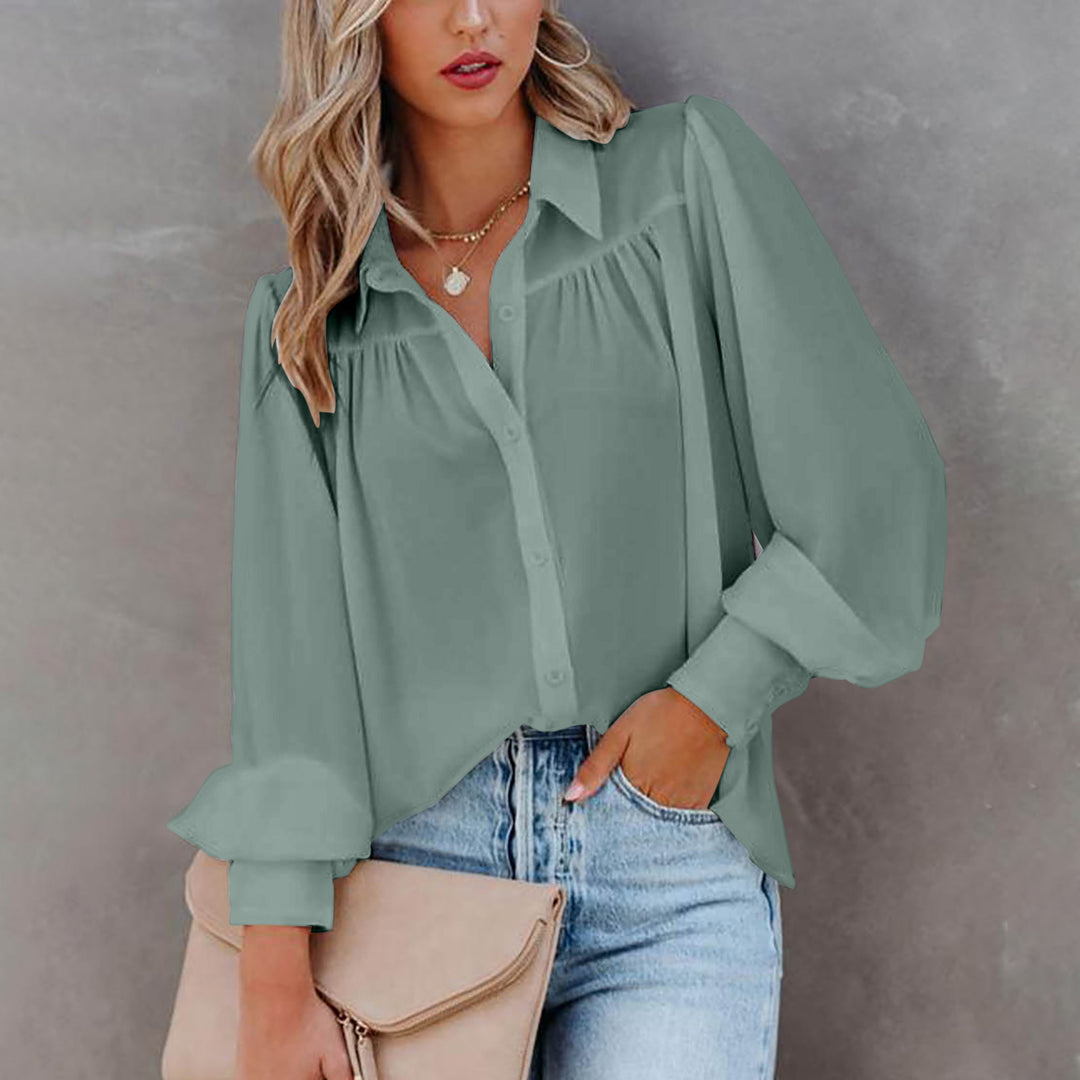 Damer Elegant Blus med romantiska puffärmar och avslappnad knäppning Mirla-Eva Jonsson