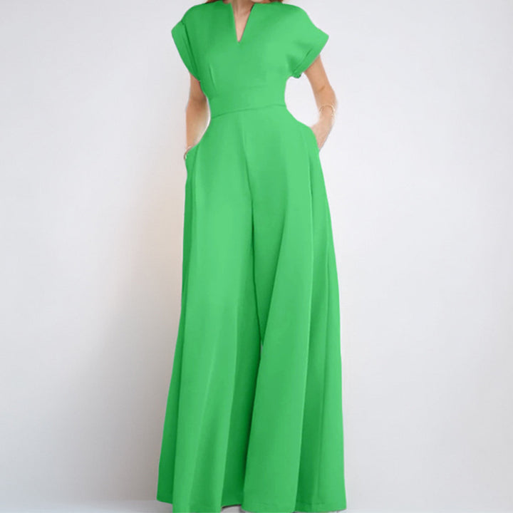 Damer Elegant Bred Jumpsuit med Korta Ärmar och Djup Urringning Mirla-Eva Jonsson