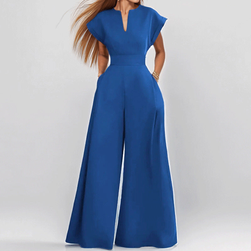 Damer Elegant Bred Jumpsuit med Korta Ärmar och Djup Urringning Mirla-Eva Jonsson