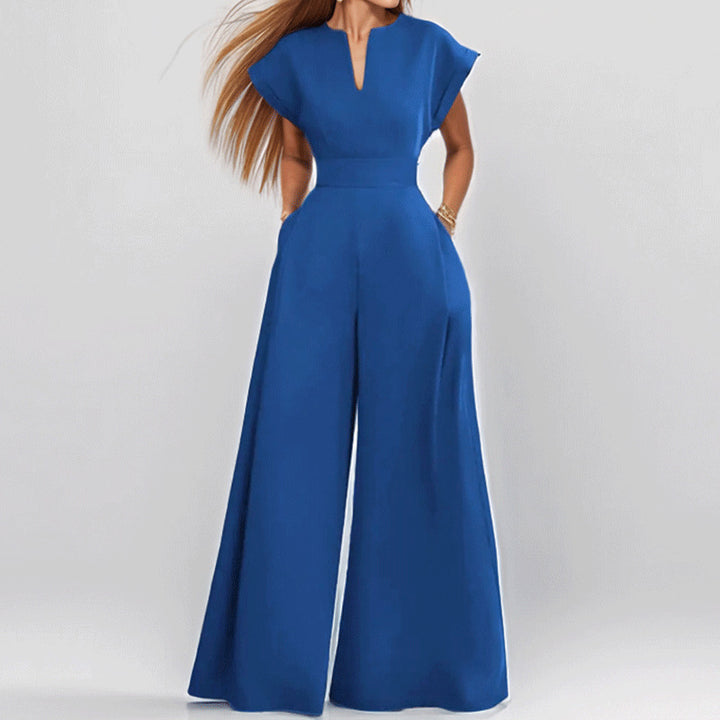 Damer Elegant Bred Jumpsuit med Korta Ärmar och Djup Urringning Mirla-Eva Jonsson