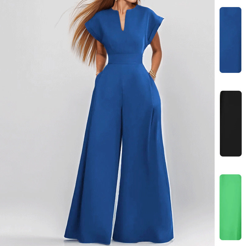 Damer Elegant Bred Jumpsuit med Korta Ärmar och Djup Urringning Mirla-Eva Jonsson