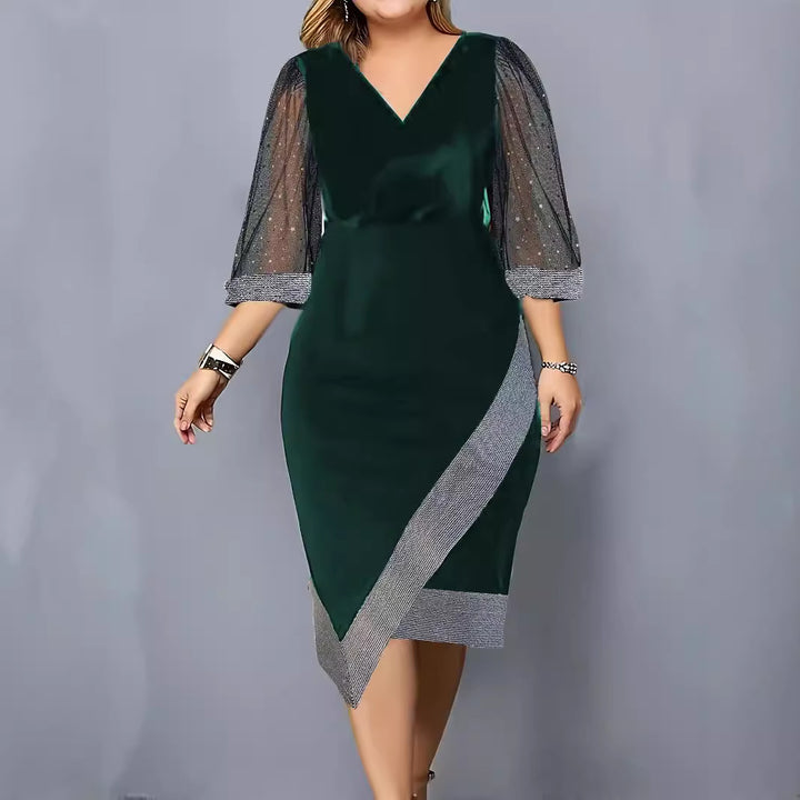 Damer Elegant Cocktailklänning med transparenta puffärmar och asymmetrisk nertill Mirla-Eva Jonsson