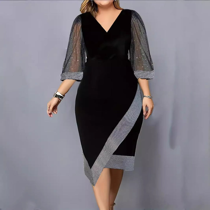 Damer Elegant Cocktailklänning med transparenta puffärmar och asymmetrisk nertill Mirla-Eva Jonsson