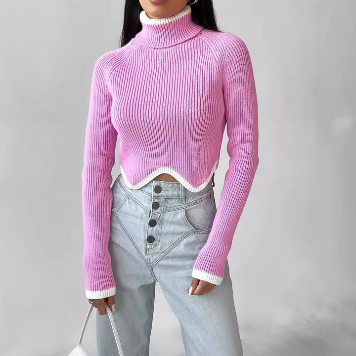 Damer Elegant Crop-Pullover med Rullkrage och Lekfull Nederkant Mirla-Eva Jonsson
