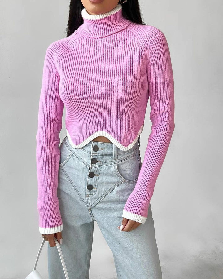 Damer Elegant Crop-Pullover med Rullkrage och Lekfull Nederkant Mirla-Eva Jonsson
