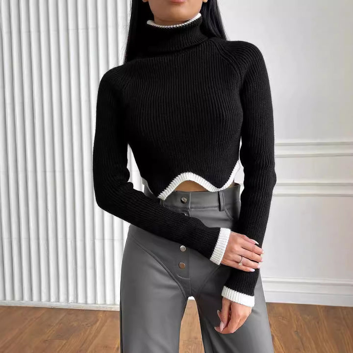Damer Elegant Crop-Pullover med Rullkrage och Lekfull Nederkant Mirla-Eva Jonsson