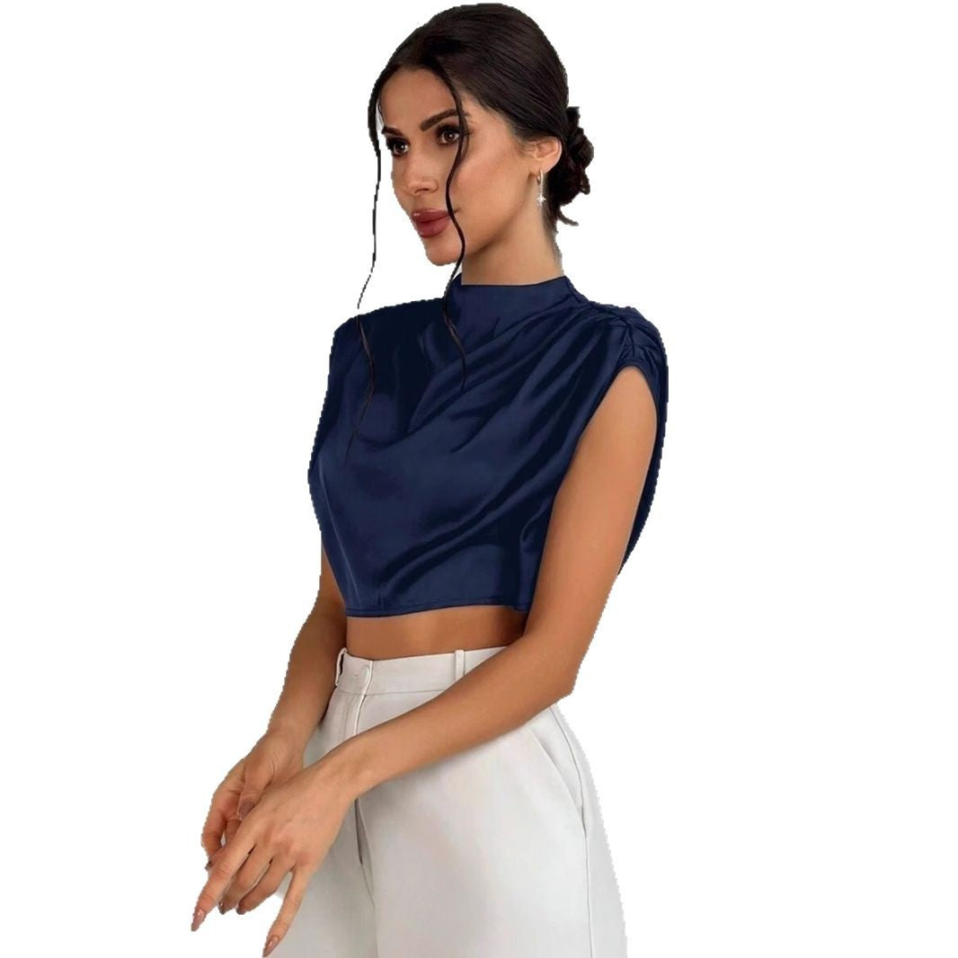 Damer Elegant Crop-Top med voluminösa ärmar och ädel ryggöppning Mirla-Eva Jonsson