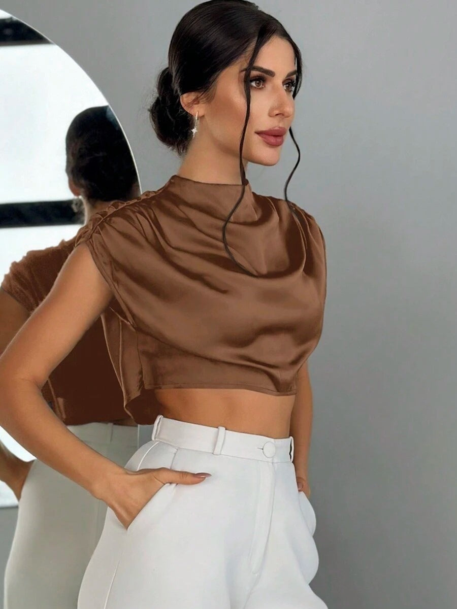 Damer Elegant Crop-Top med voluminösa ärmar och ädel ryggöppning Mirla-Eva Jonsson