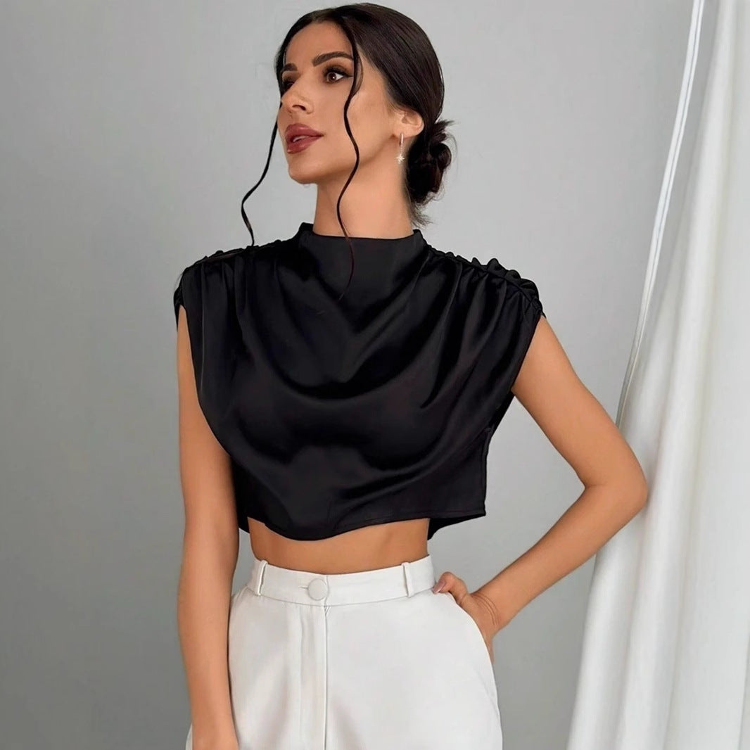 Damer Elegant Crop-Top med voluminösa ärmar och ädel ryggöppning Mirla-Eva Jonsson
