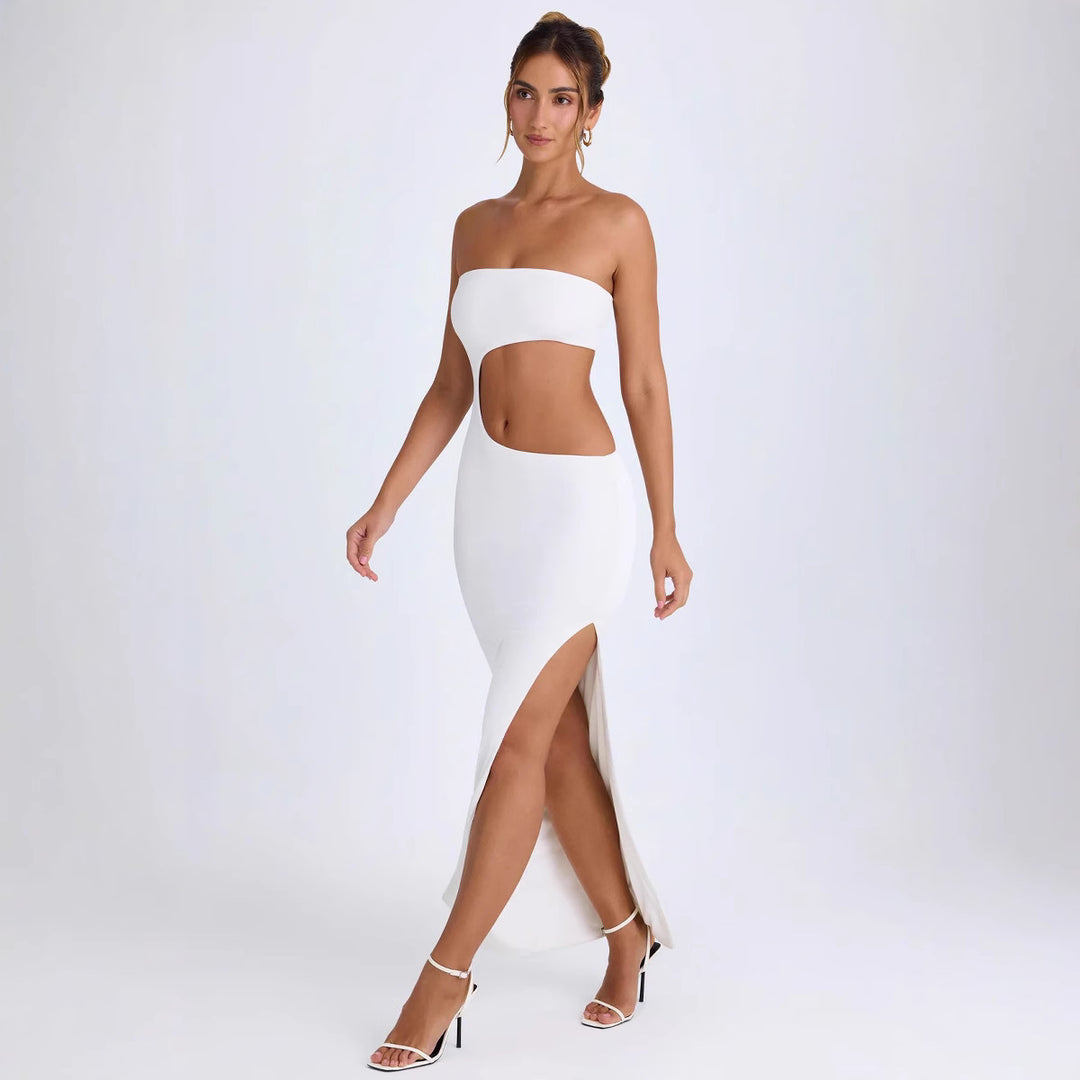 Damer Elegant Cut-Out Maxiklänning med Axelbandslös Design och Hög Slits Mirla-Eva Jonsson