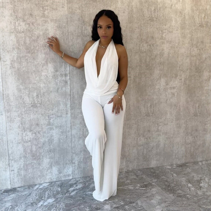 Damer Elegant Deep-V Jumpsuit med svängd rygg och vida ben Mirla-Eva Jonsson