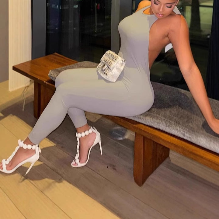 Damer Elegant Endel med djup ryggöppning och asymmetrisk design Mirla-Eva Jonsson