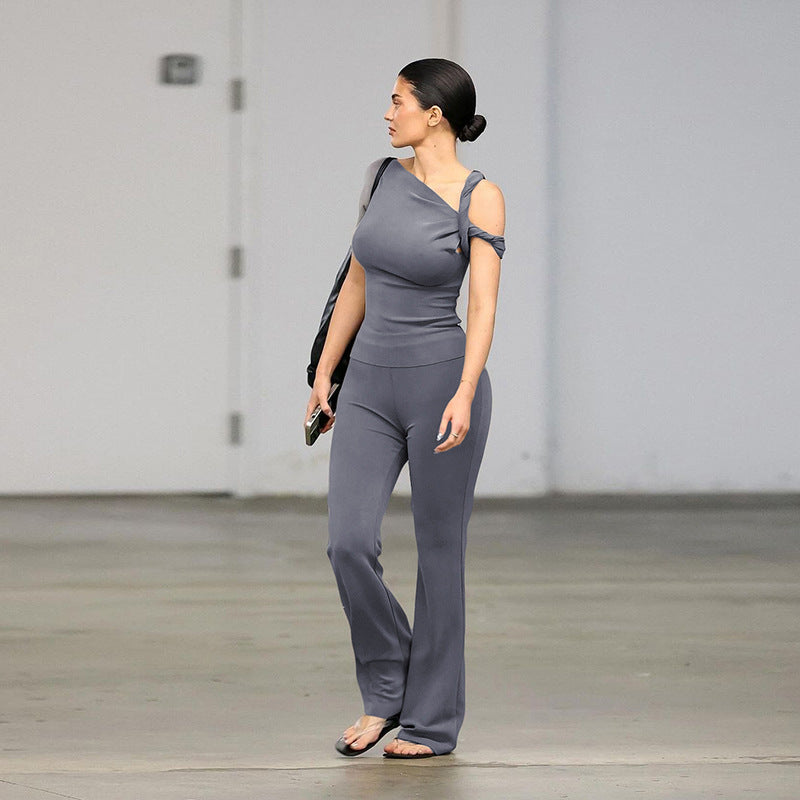 Damer Elegant Enhet med asymmetrisk skärning och smakfull detalj Mirla-Eva Jonsson