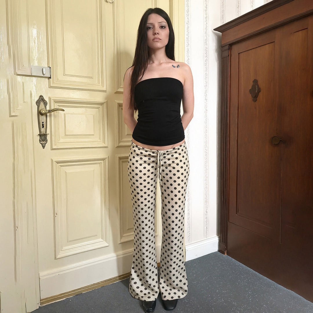 Damer Elegant Flared-byxa med justerbart knytbälte och klassiskt prikkmönster Mirla-Eva Jonsson