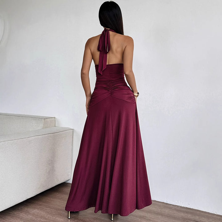 Damer Elegant Halterklänning med djupt V-ringning och sofistikerad drapering Mirla-Eva Jonsson