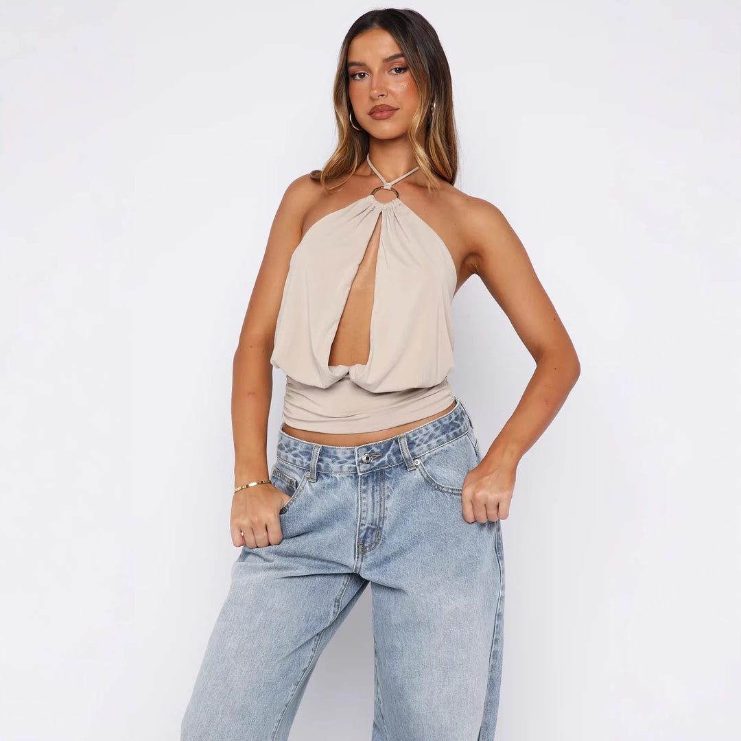 Damer Elegant Halterneck-top med sofistikerad U-ringning och dekorativ ringdetalj Mirla-Eva Jonsson