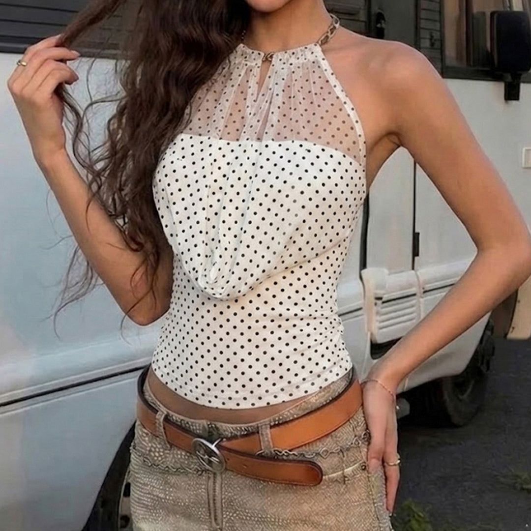 Damer Elegant Halterneck-top med transparenta accenter och lekfullt prickigt design Mirla-Eva Jonsson