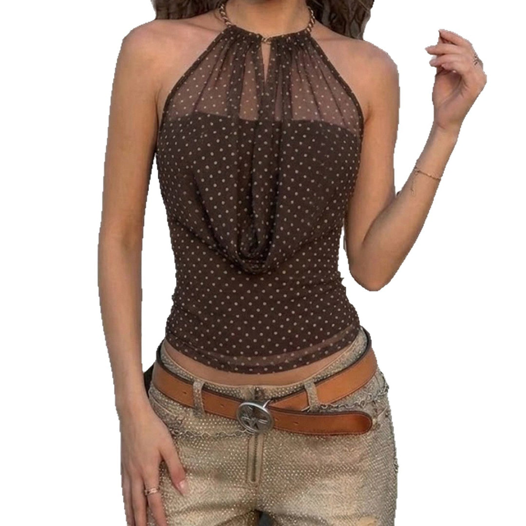 Damer Elegant Halterneck-top med transparenta accenter och lekfullt prickigt design Mirla-Eva Jonsson