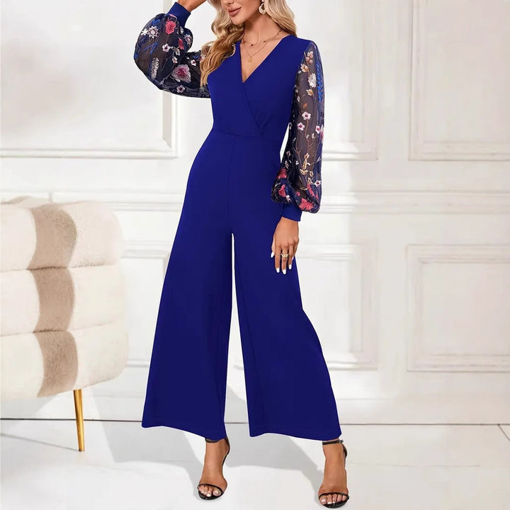 Damer Elegant Jumpsuit med Blommiga Spetsärmar och Vid Ben Mirla-Eva Jonsson