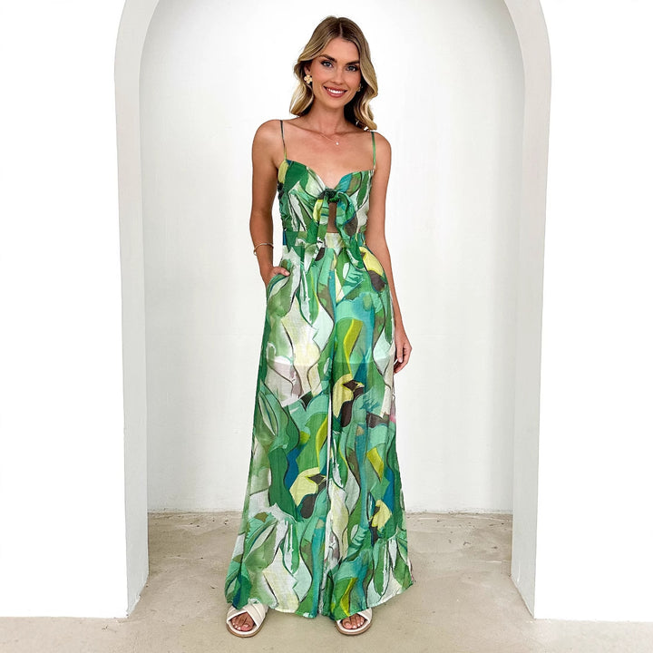Damer Elegant Jumpsuit med Blomsterdesign och Justerbara Spaghettiband Mirla-Eva Jonsson
